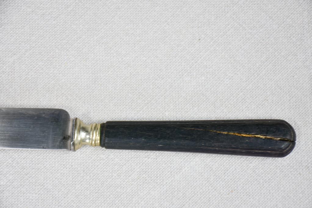 Collection of antique French knives with black handles