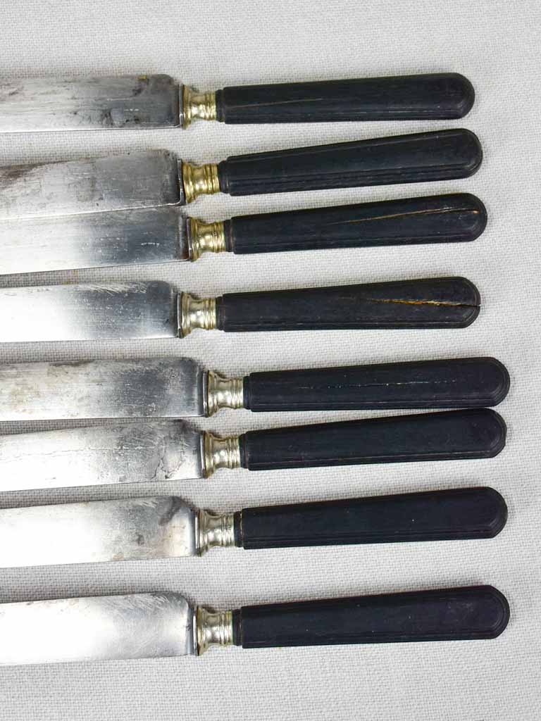 Collection of antique French knives with black handles