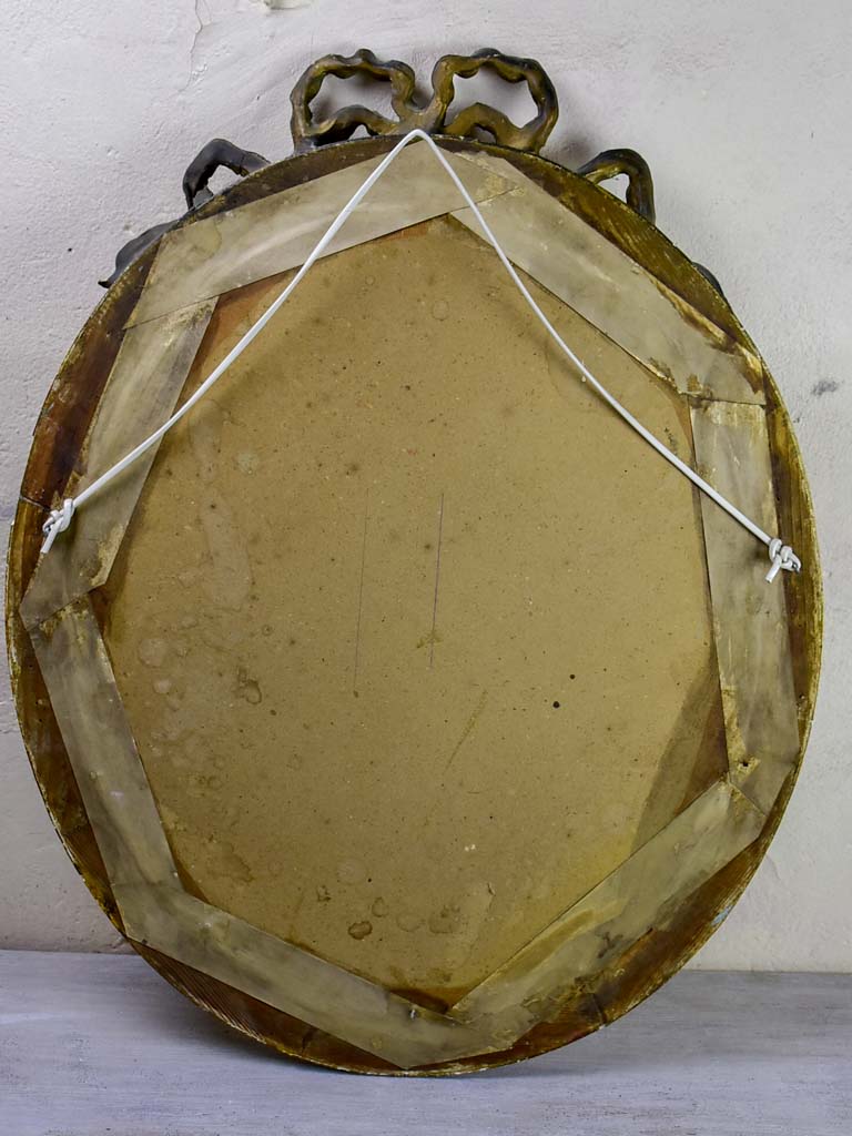 Oval Louis XVI mirror with bow 23¾" x 30"