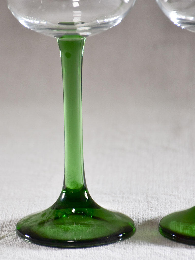 Set of six Alsace wine glasses with dark green stems