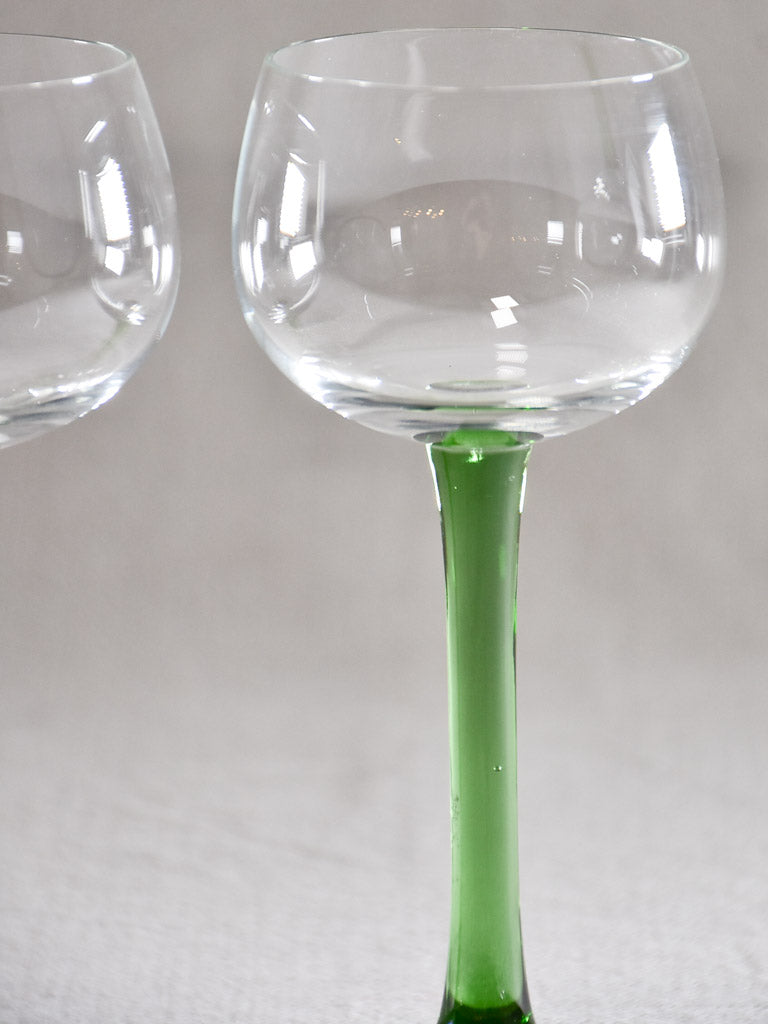 Set of six Alsace wine glasses with dark green stems