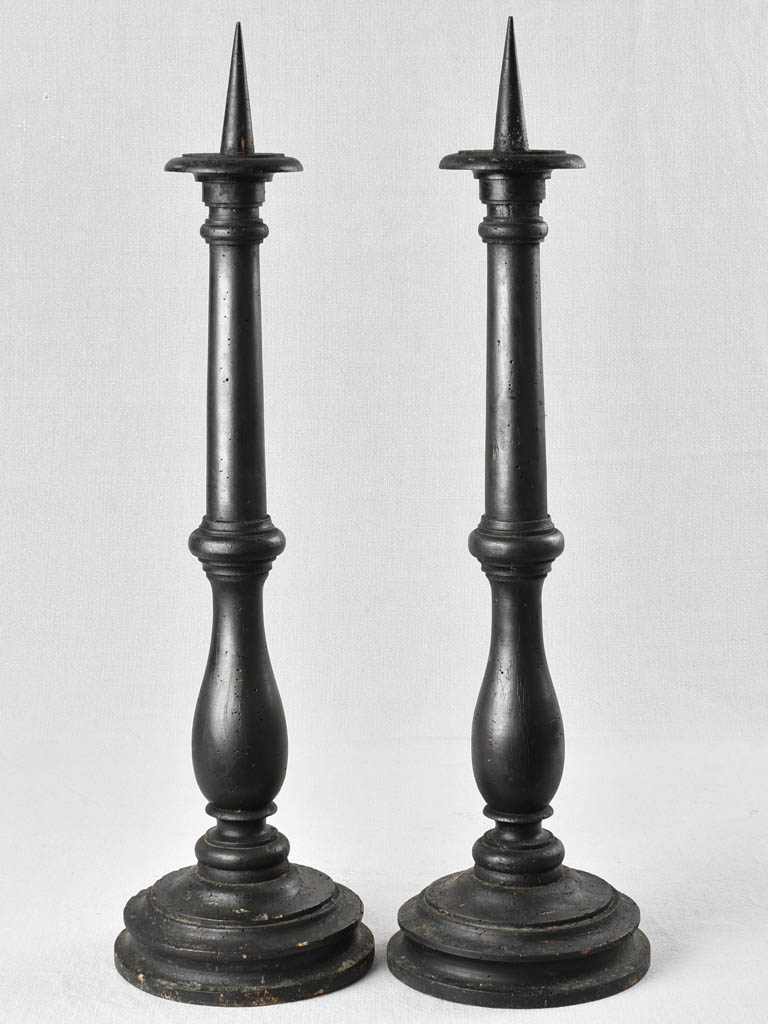 Pair of large antique candlesticks with black paint finish 27½"