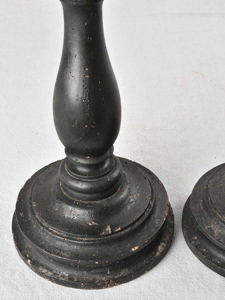 Pair of large antique candlesticks with black paint finish 27½"
