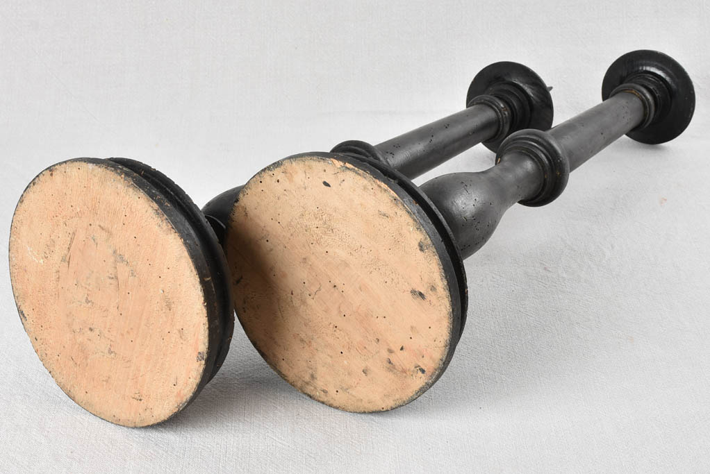 Pair of large antique candlesticks with black paint finish 27½"