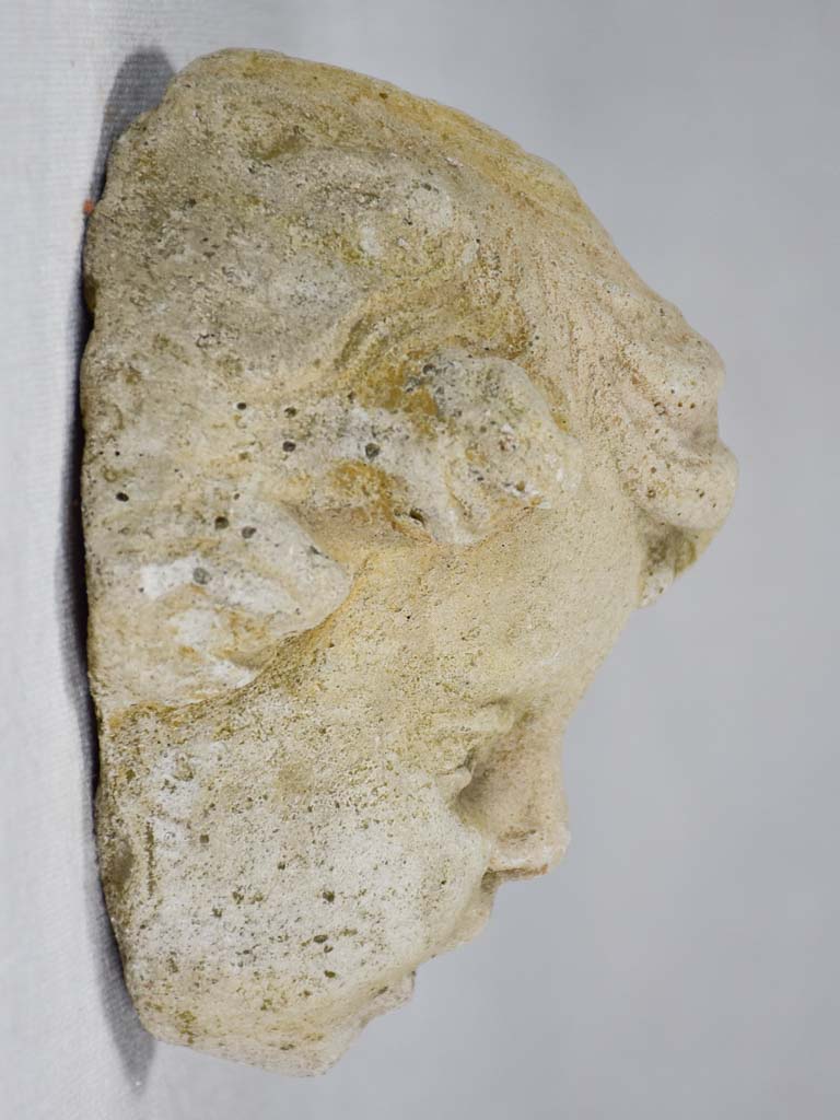 Stone sculpture of an angel's face from a fountain 5½"