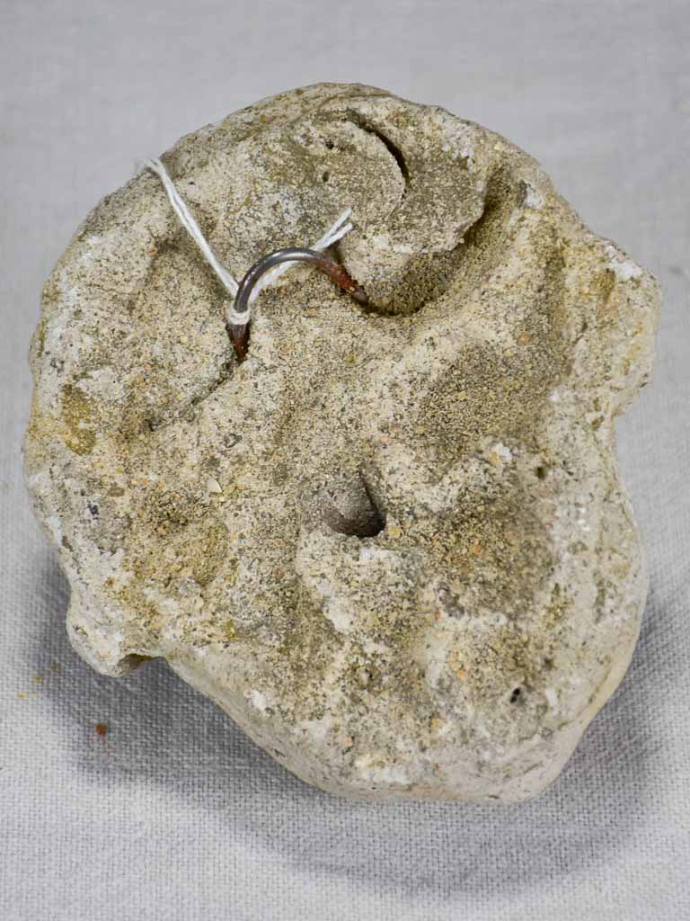 Stone sculpture of an angel's face from a fountain 5½"