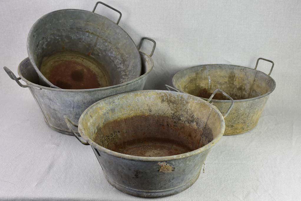 Collection of 4 rustic French zinc wash basins