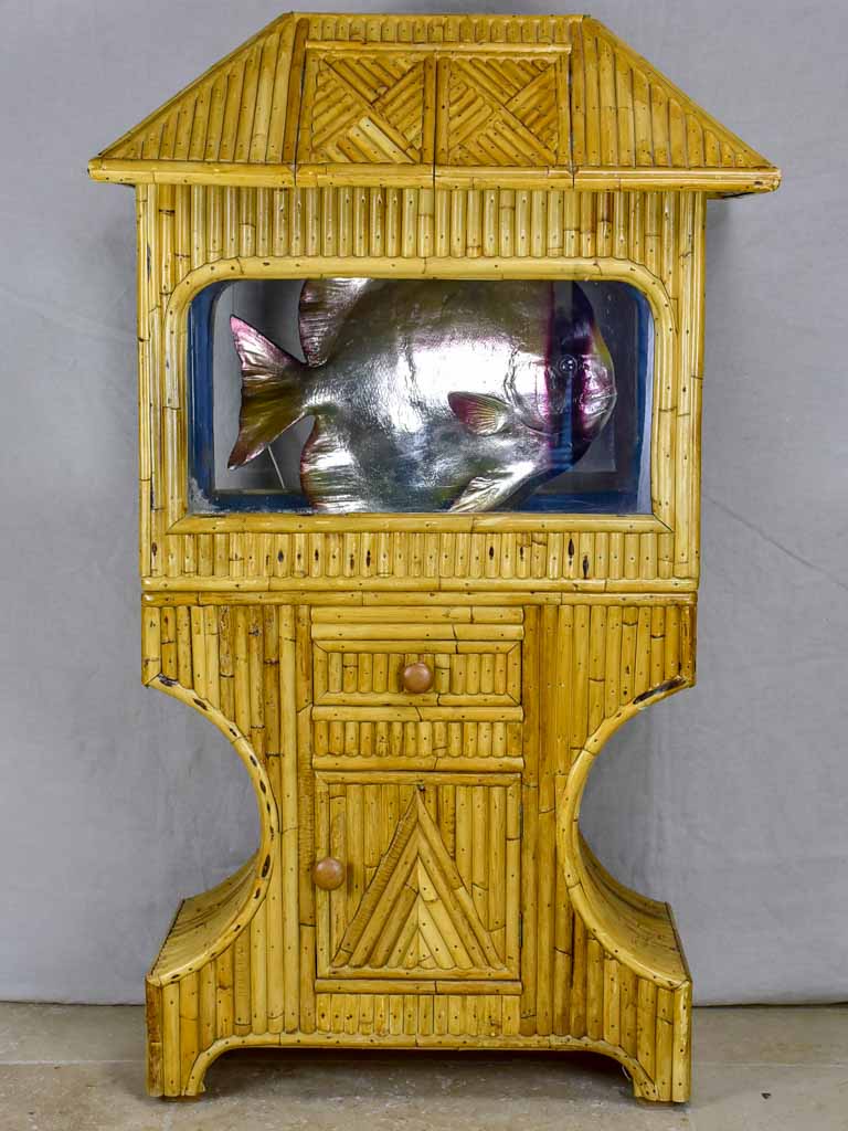 Unique fluorescent-lit bamboo fish habitat