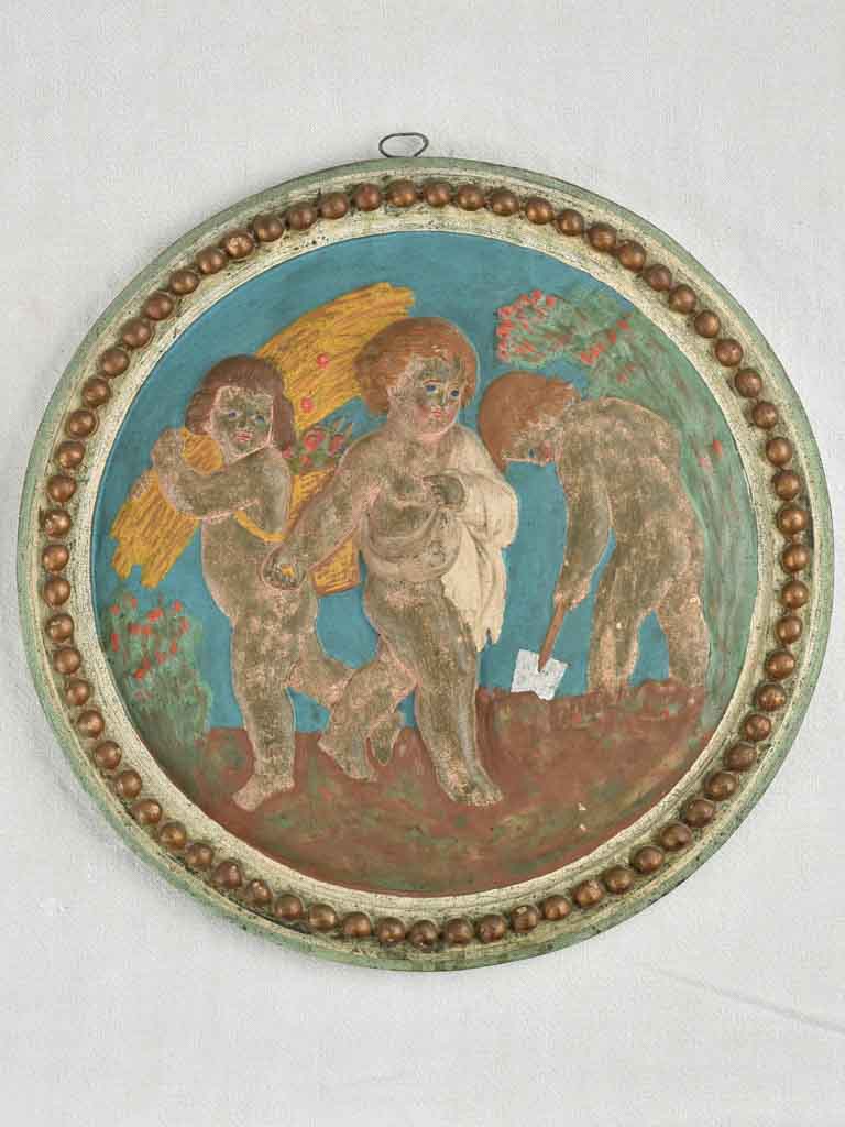 Pair of 19th century medallions / tondos w/ cherubs 19"