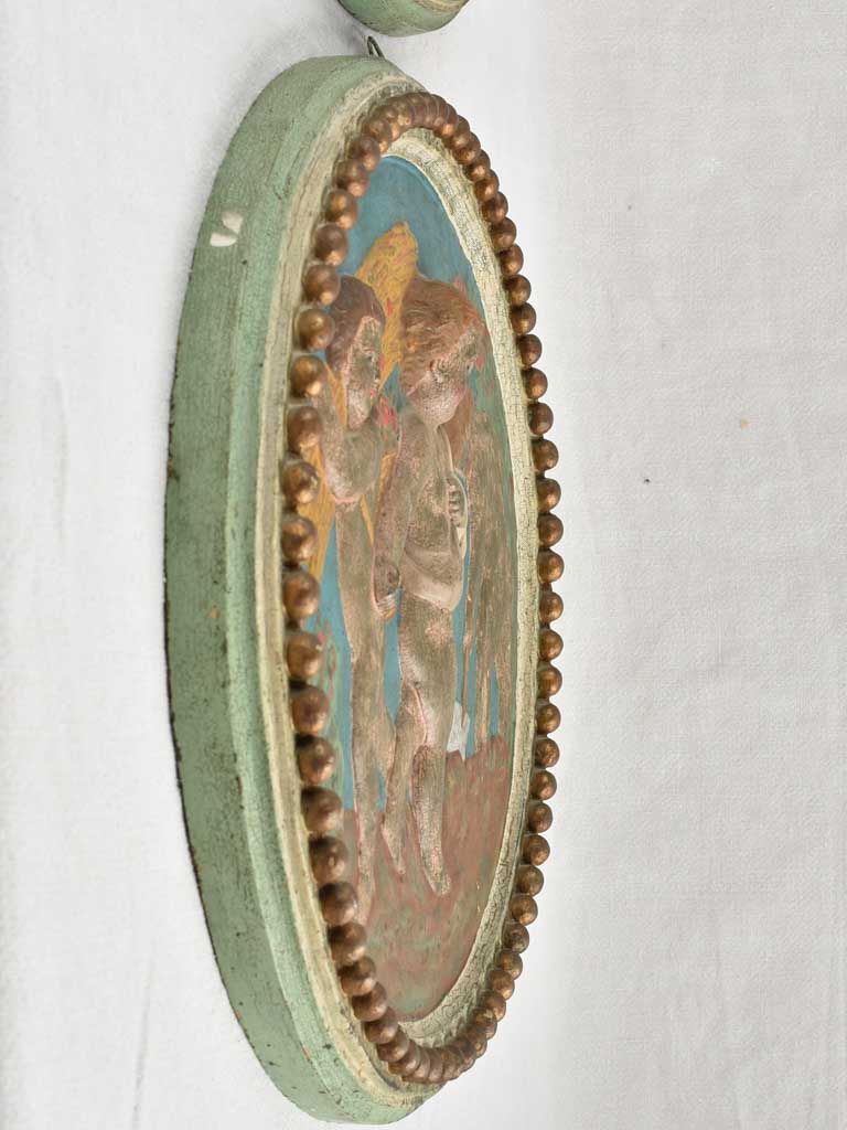 Pair of 19th century medallions / tondos w/ cherubs 19"