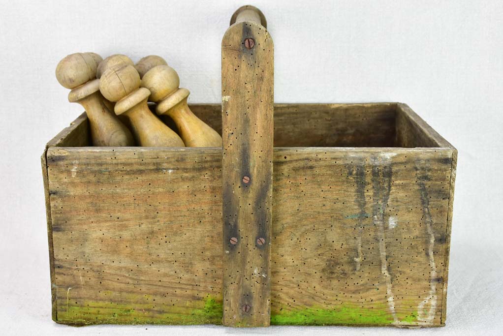 Skittles game and ball in an antique French toolbox