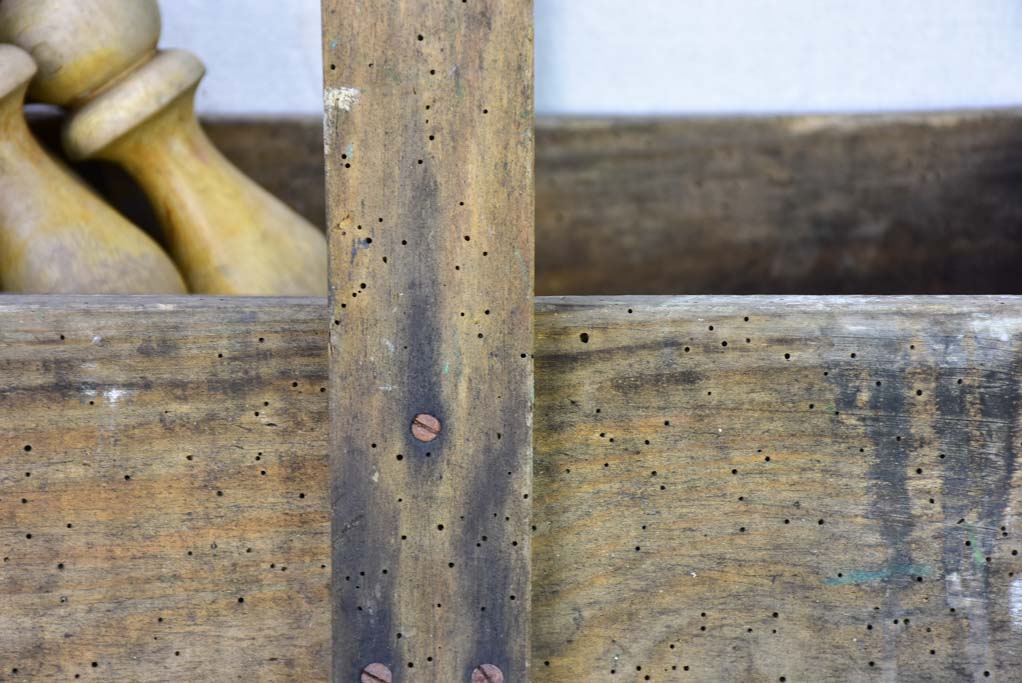 Skittles game and ball in an antique French toolbox