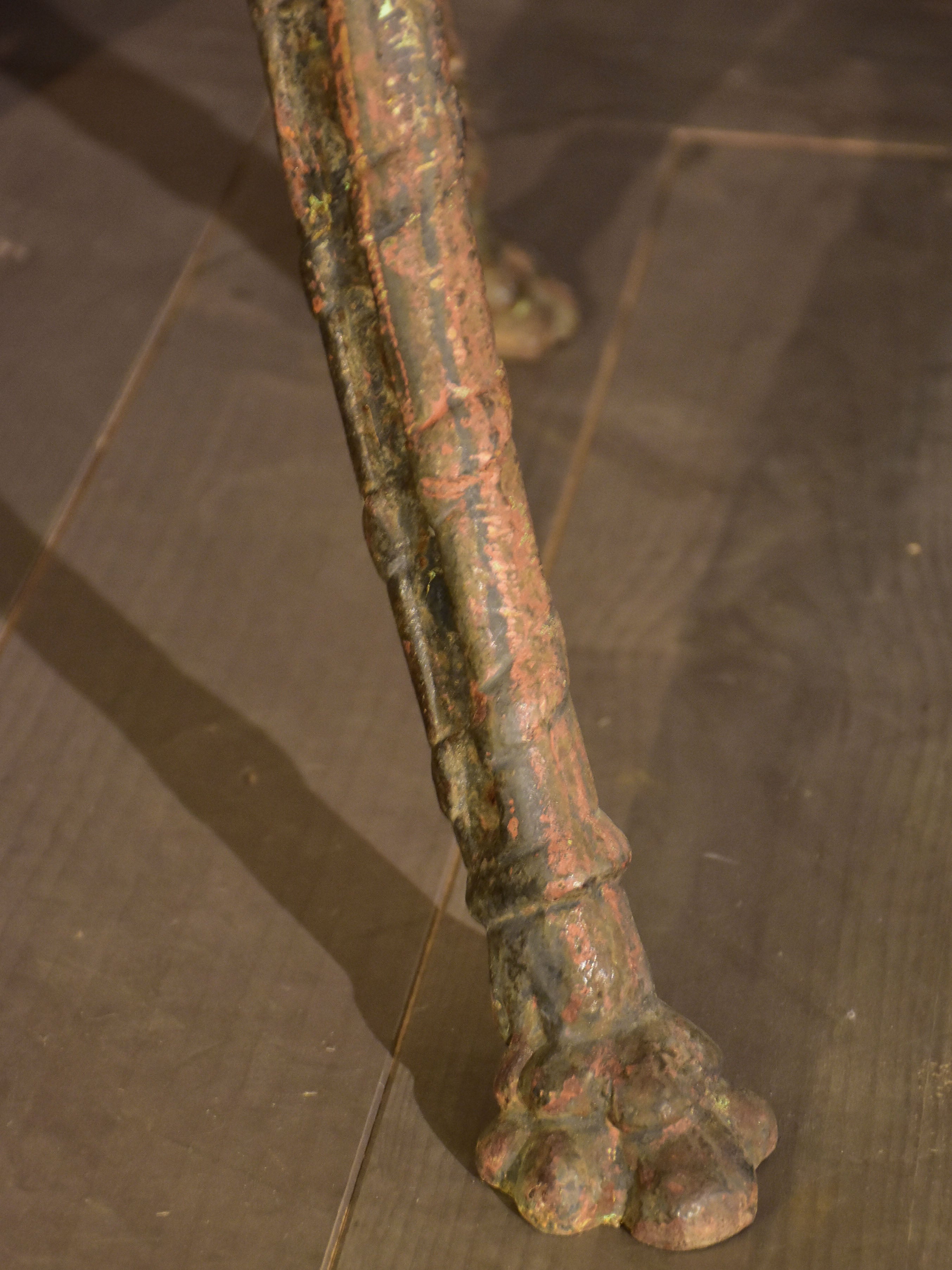 Large round table with cast iron legs and slate table top