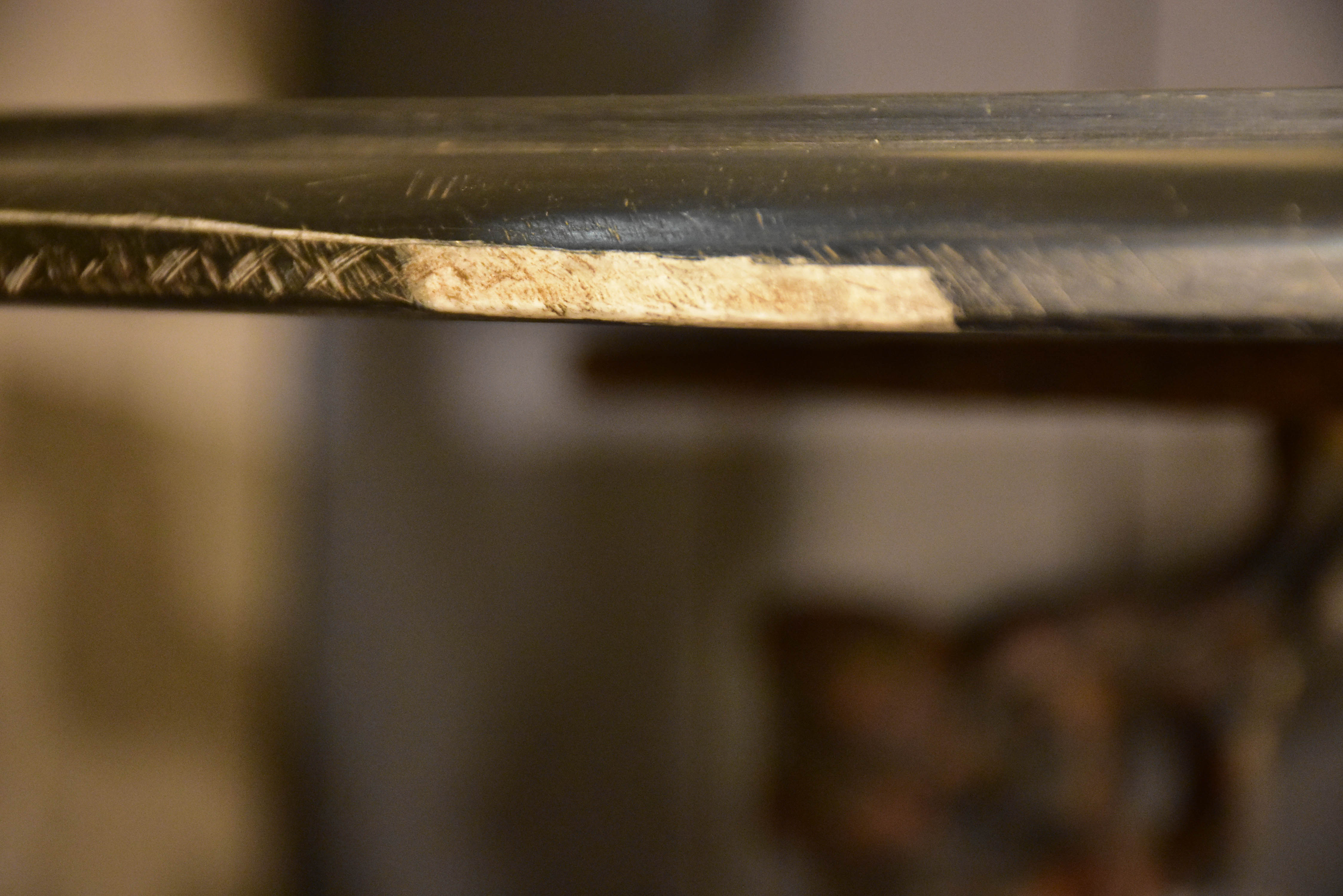 Large round table with cast iron legs and slate table top