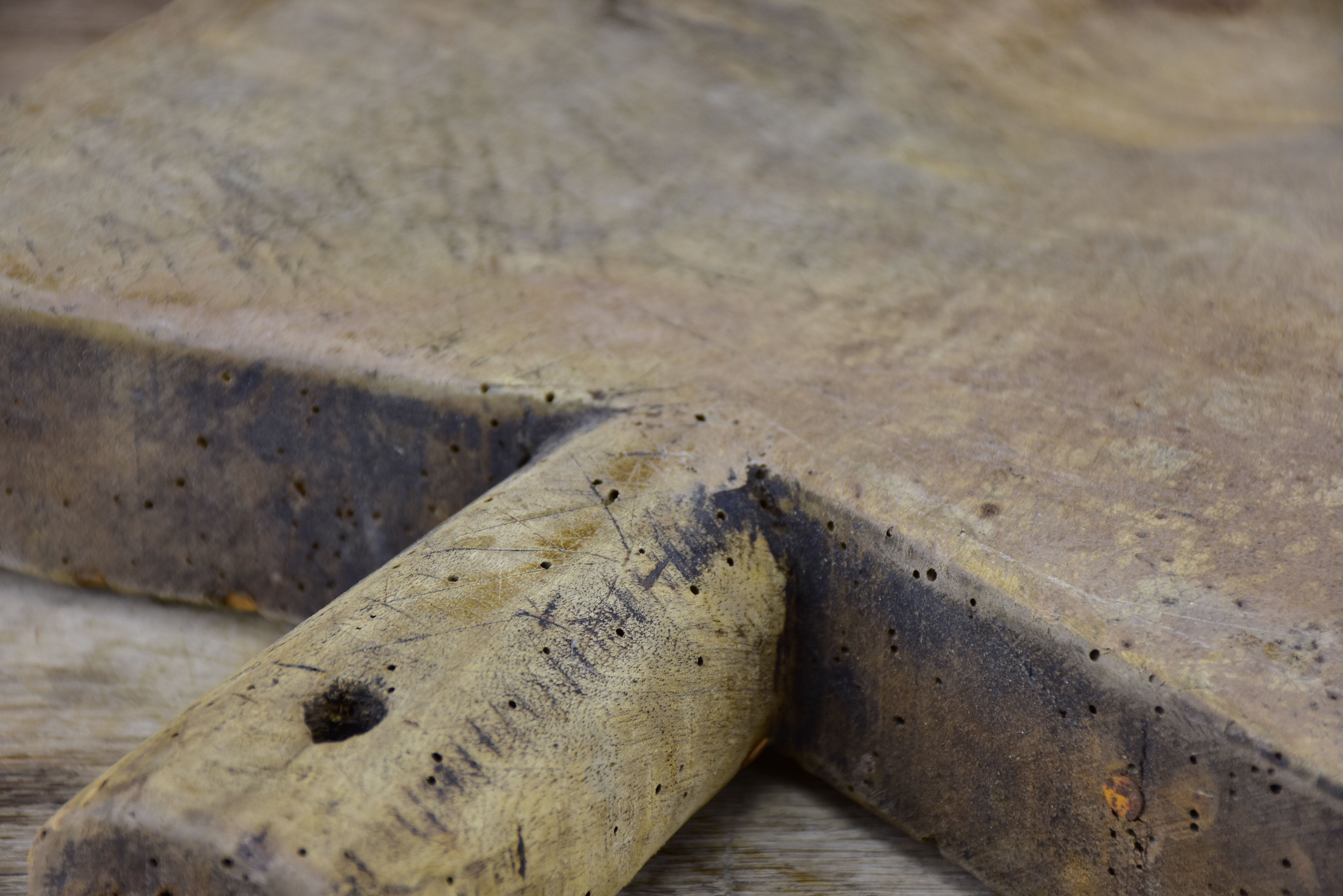 Antique French cutting board with peaked shoulders