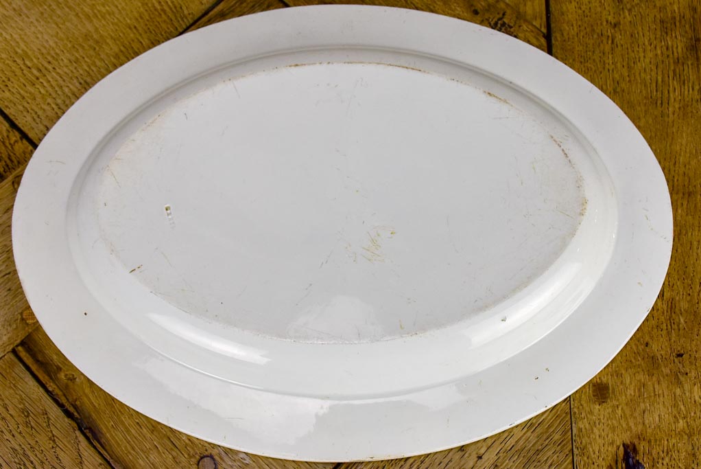 Oval faience platter with mythological scene - Creil