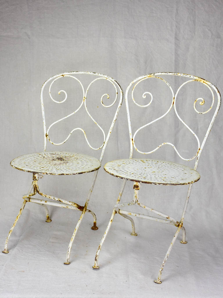 Pair of early 20th Century French children's folding garden chairs - white