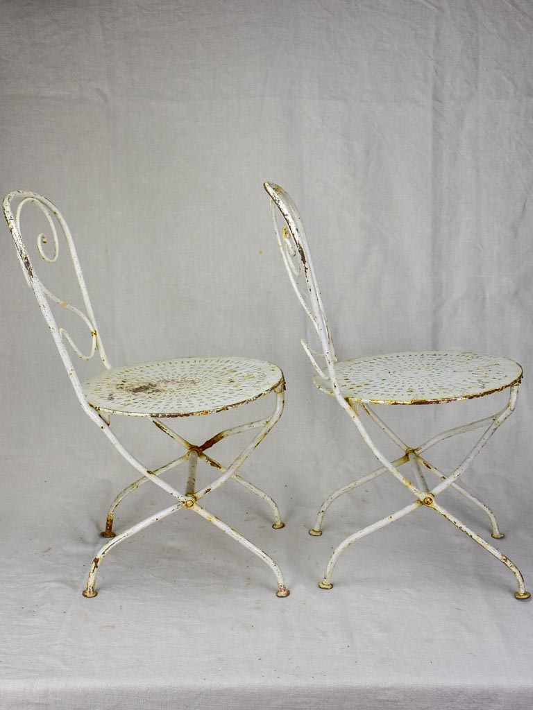 Pair of early 20th Century French children's folding garden chairs - white
