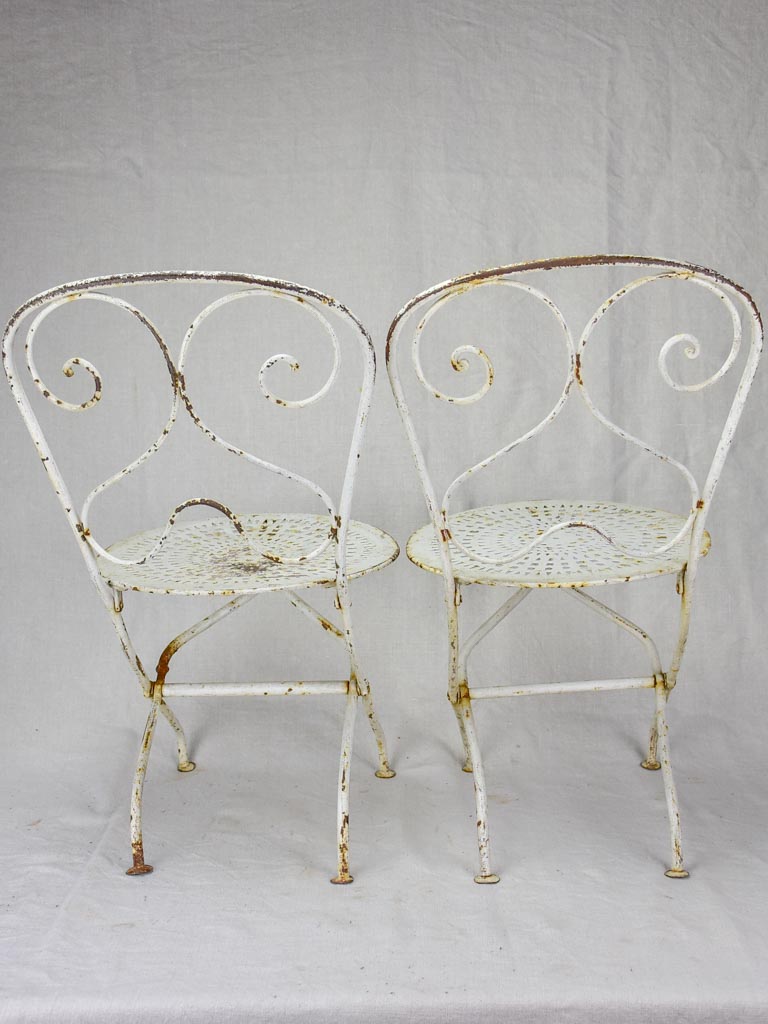 Pair of early 20th Century French children's folding garden chairs - white