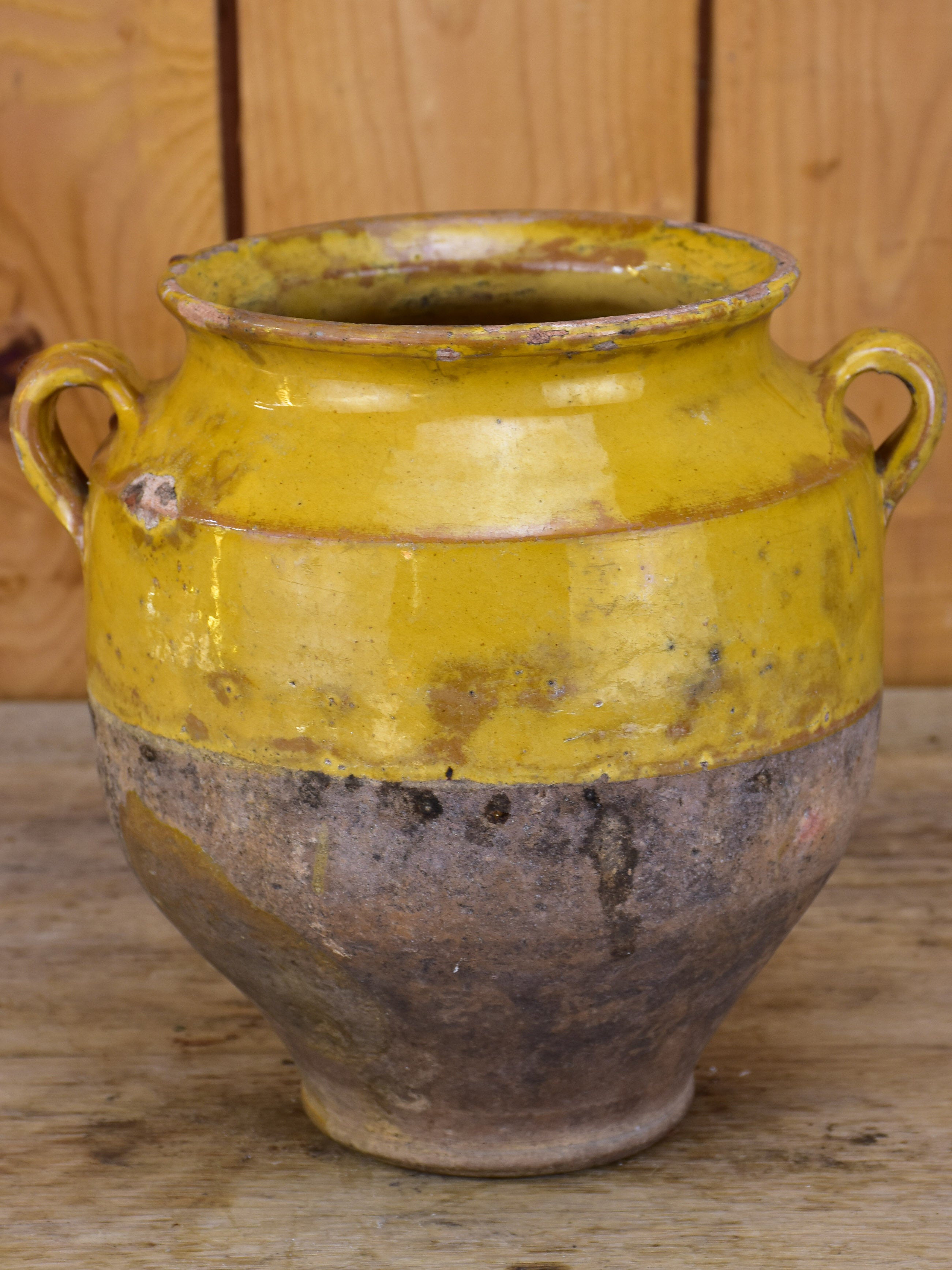 Antique French confit pot with orange glaze