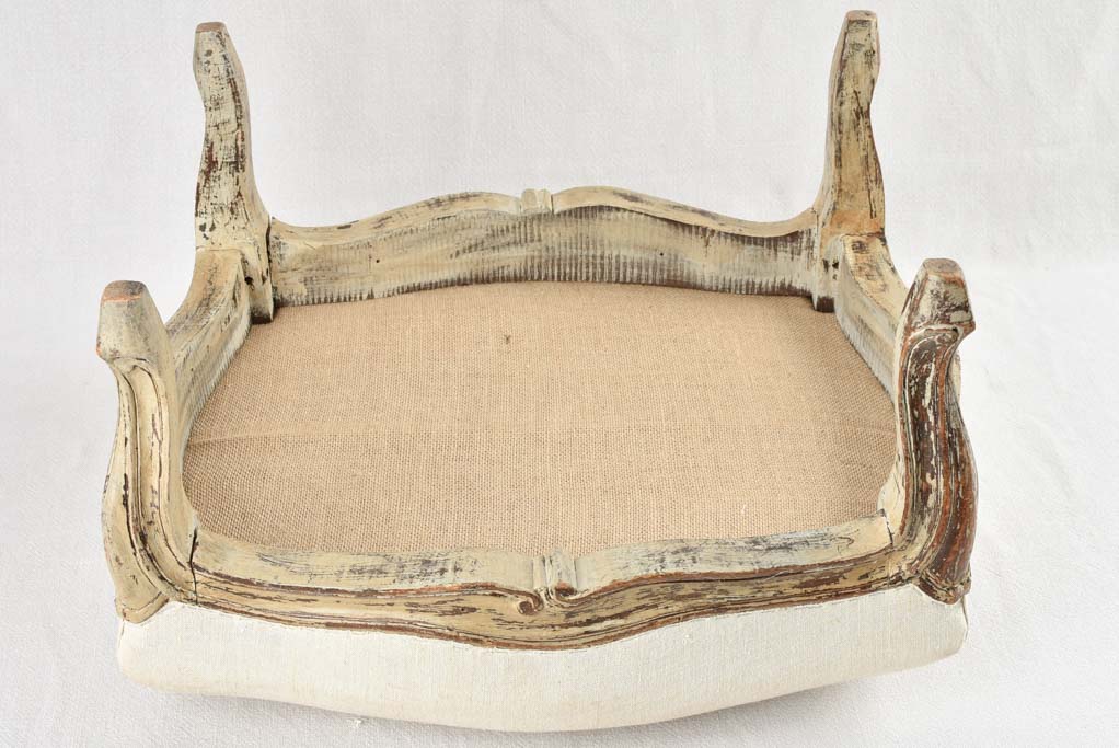 Louis XV style footrest with beige patina