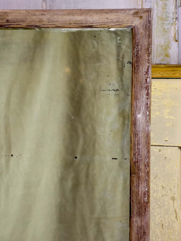 Antique rustic French mirror with simple timber frame 2/2. 26¾" x 43¼"