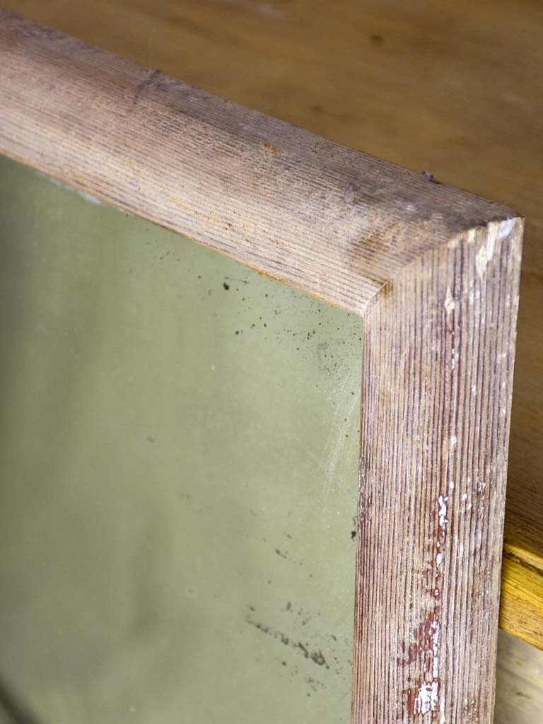 Antique rustic French mirror with simple timber frame 2/2. 26¾" x 43¼"
