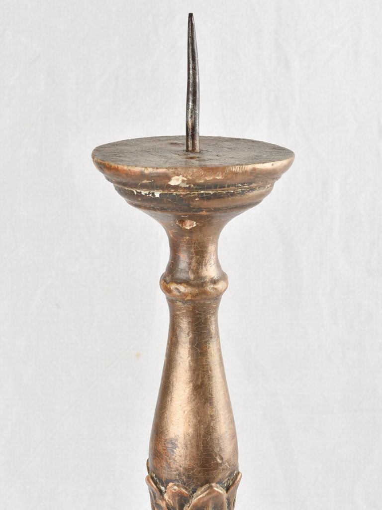 Antique altar candlestick with lion's paw