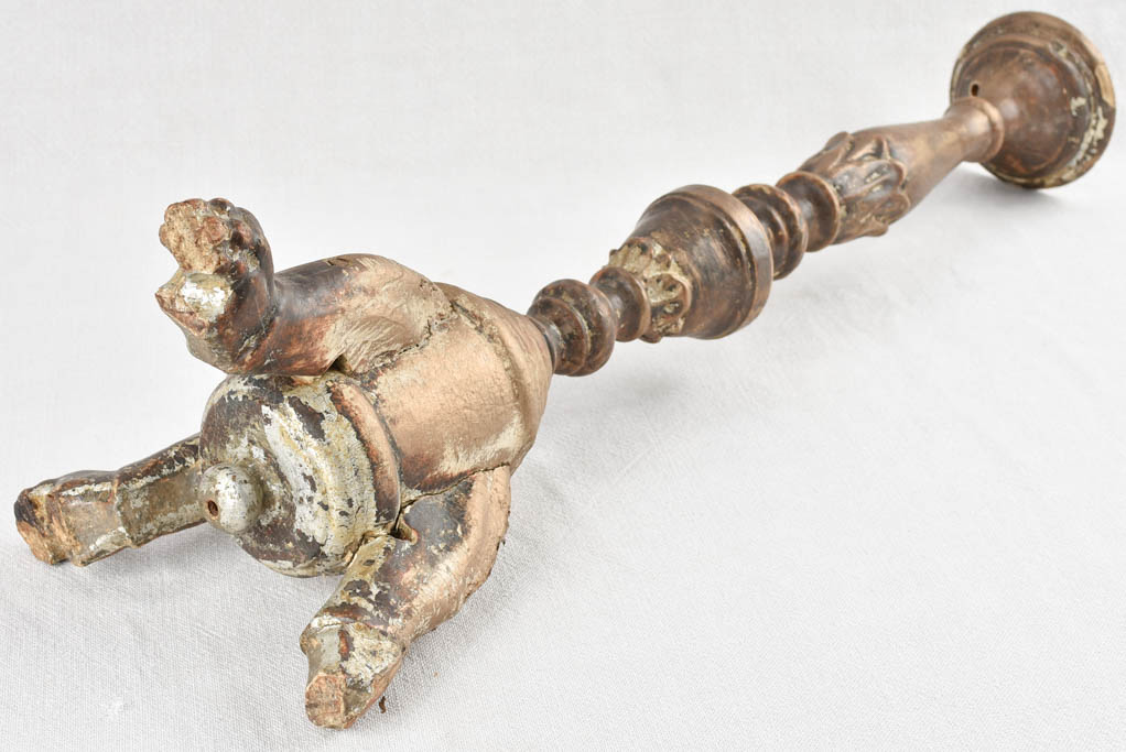 Rustic wooden candlestick with lion's paw