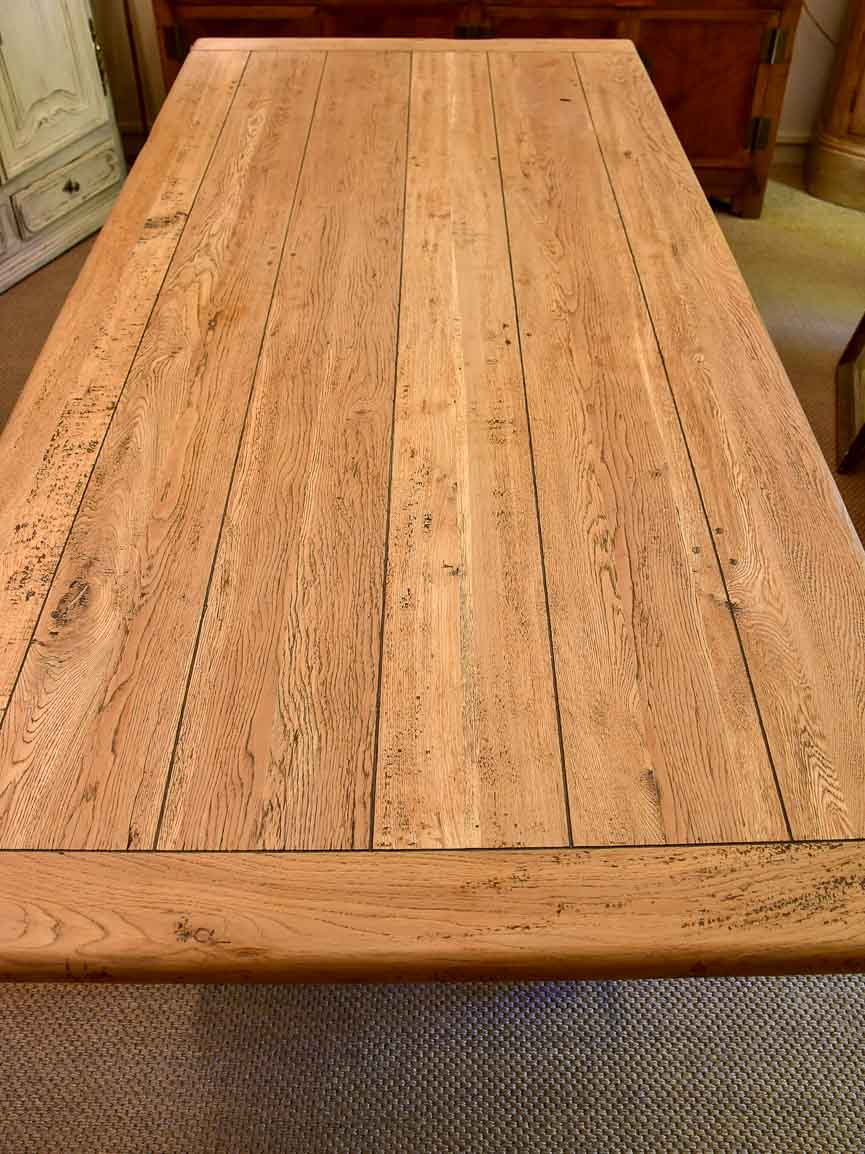 Antique French oak dining table with iron base