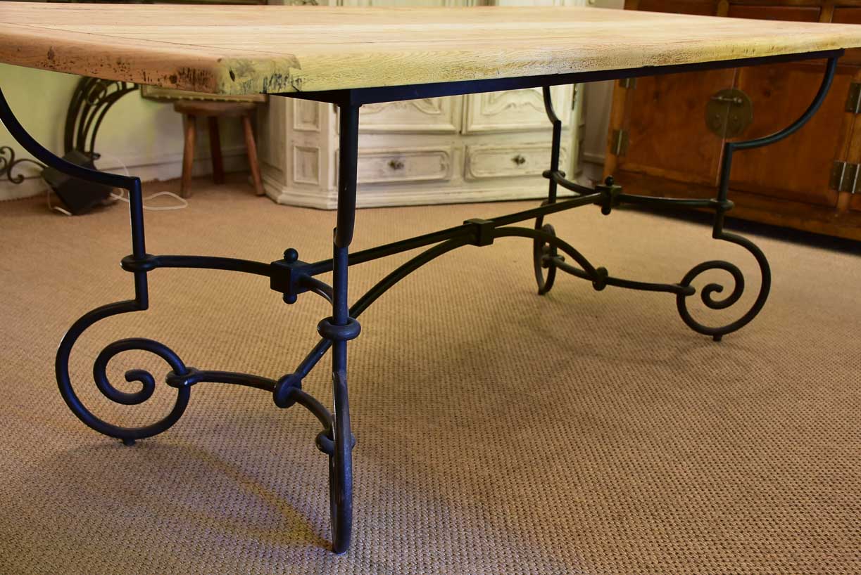 Antique French oak dining table with iron base