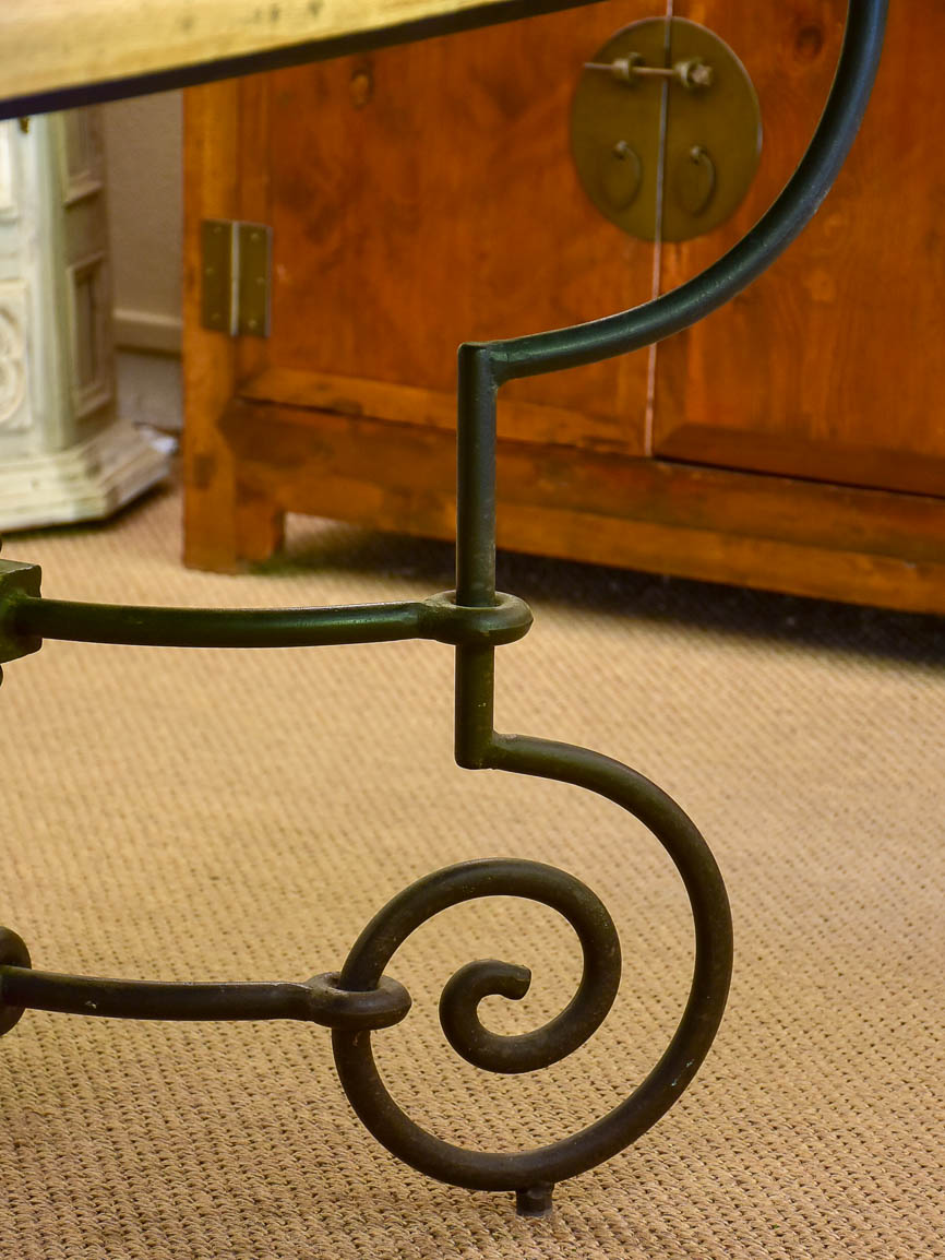 Antique French oak dining table with iron base