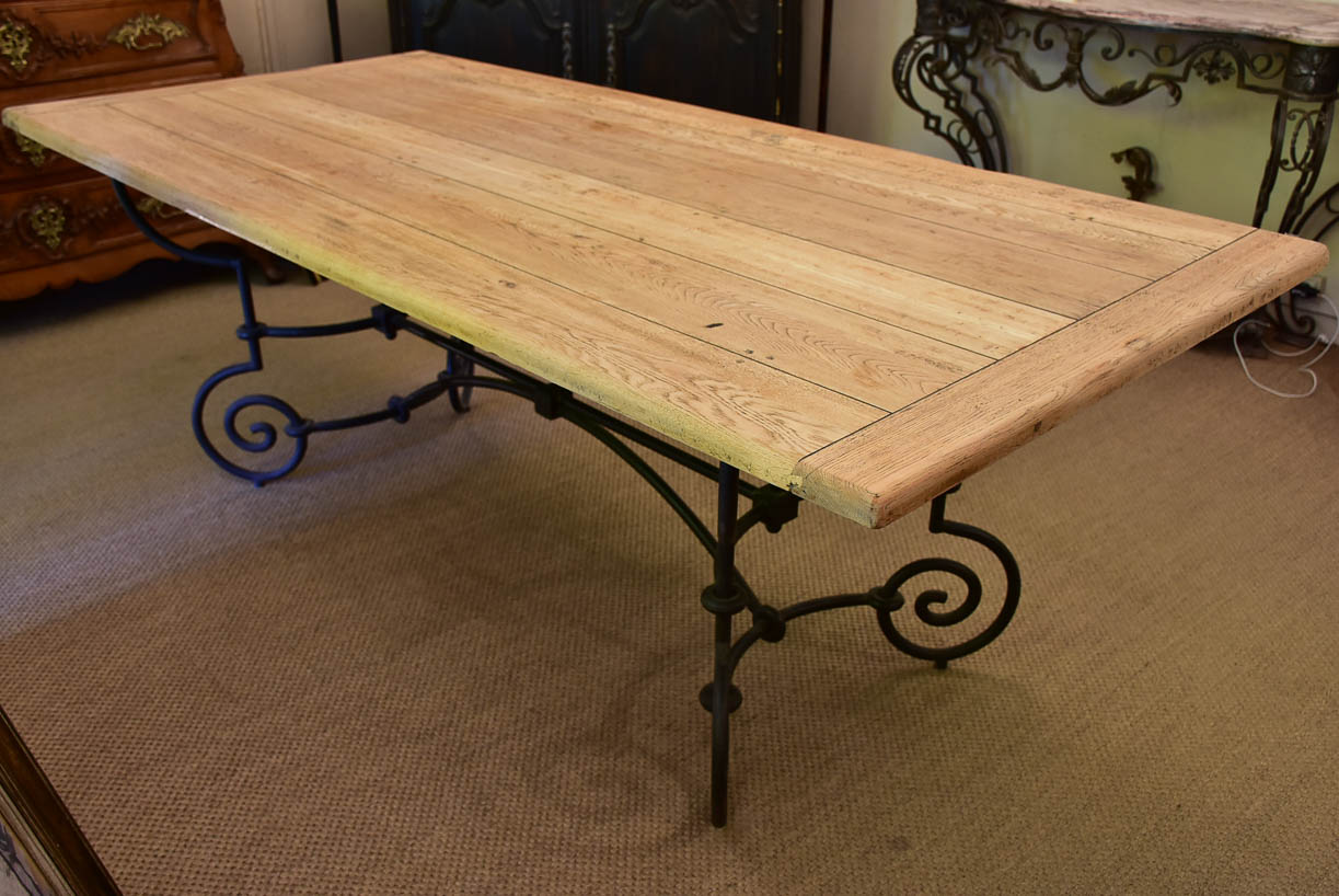 Antique French oak dining table with iron base