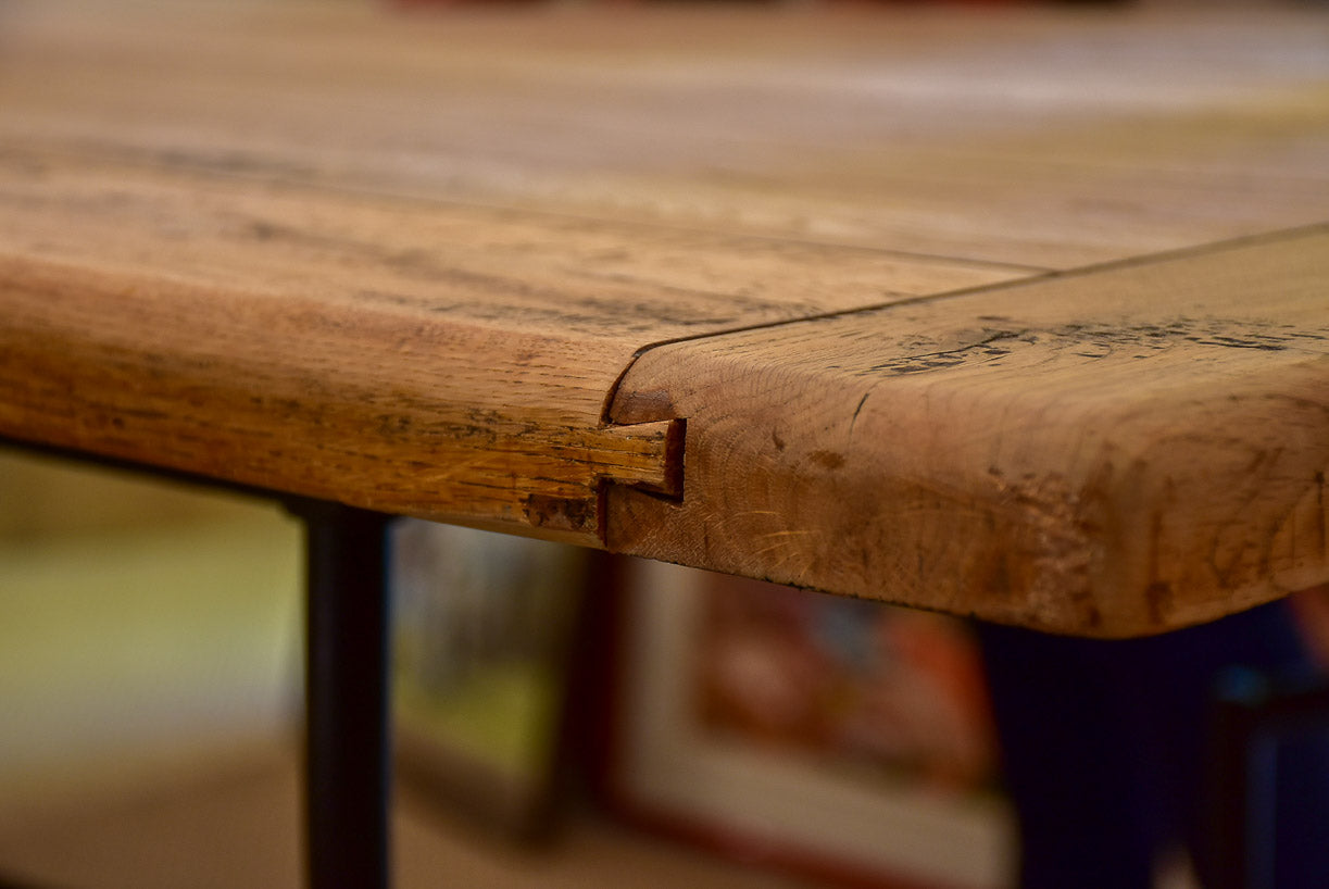 Antique French oak dining table with iron base