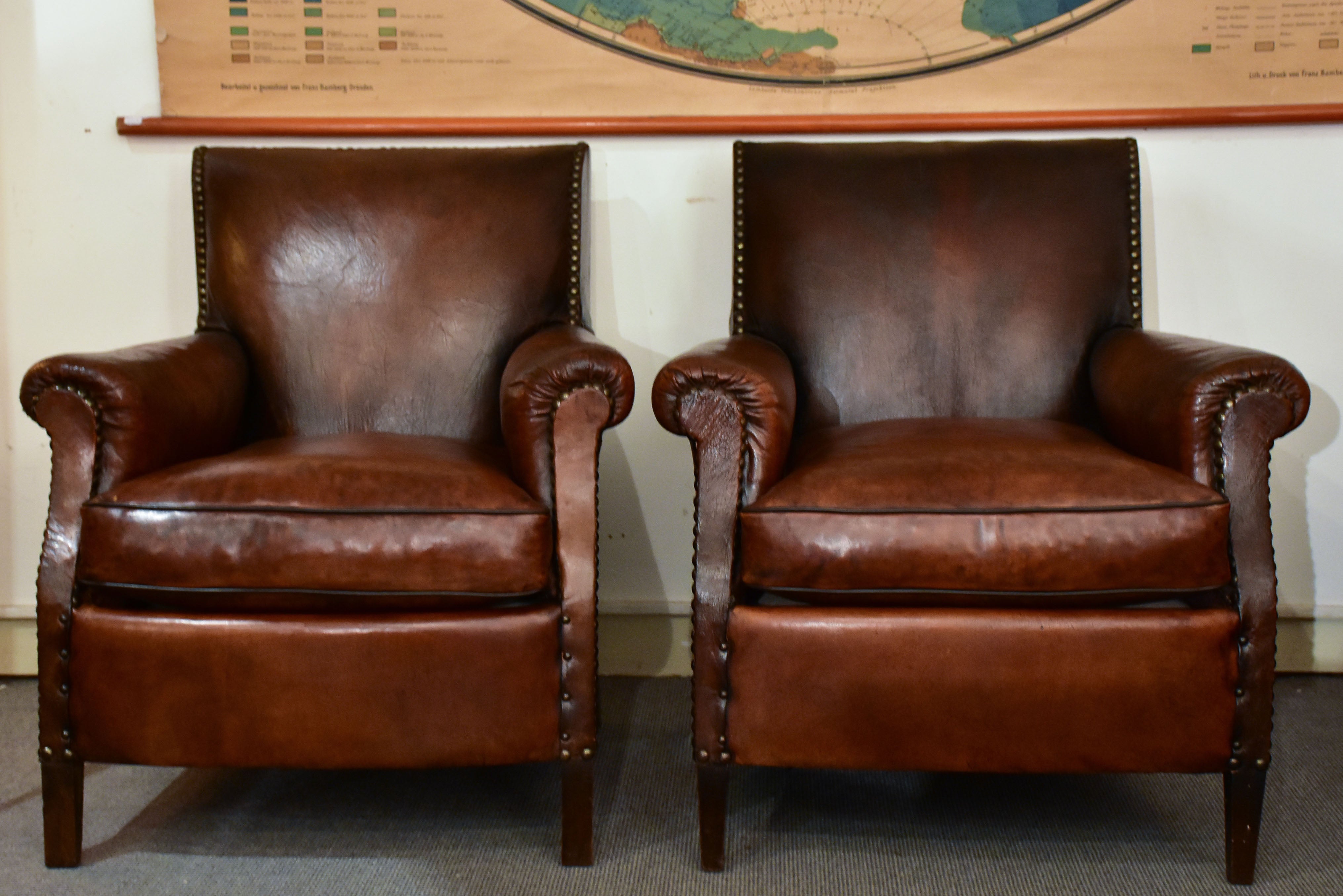 Pair of square-back French club chairs