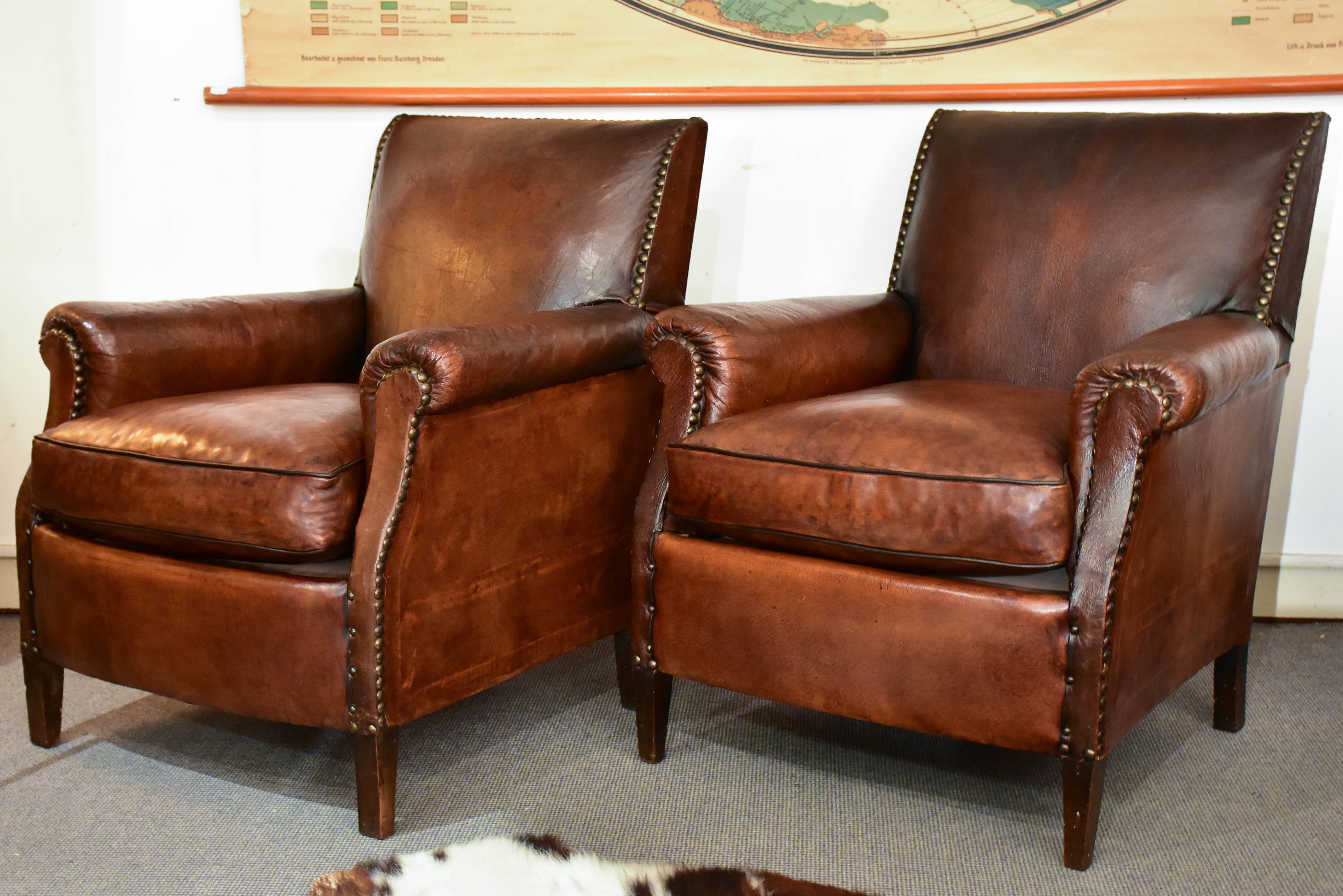 Pair of square-back French club chairs