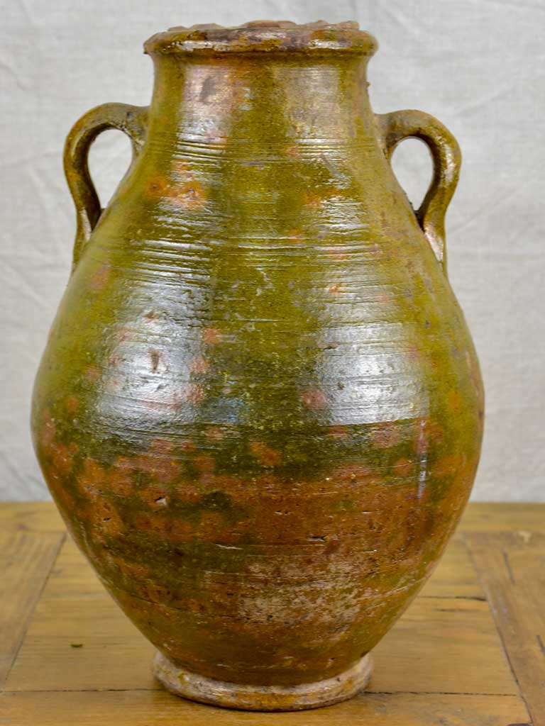 Antique terracotta pot with lid and green glaze