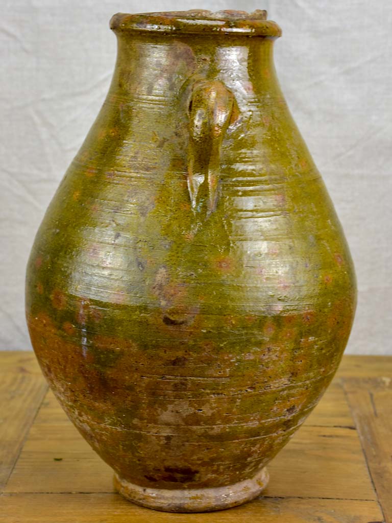 Antique terracotta pot with lid and green glaze