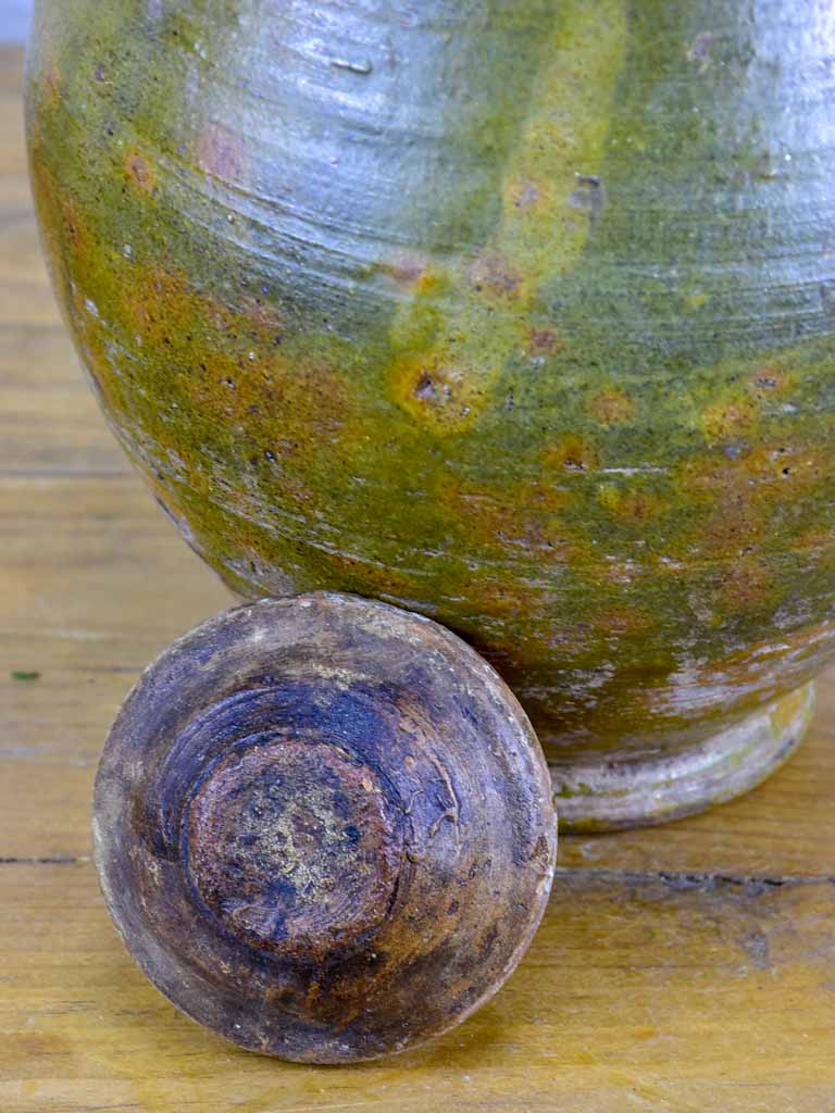 Antique terracotta pot with lid and green glaze