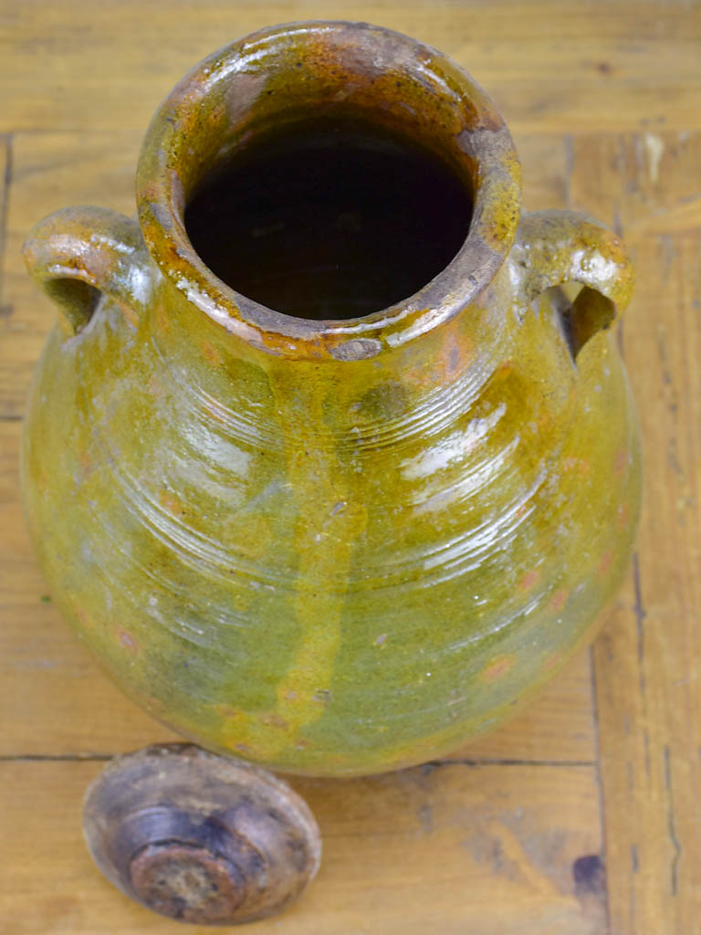 Antique terracotta pot with lid and green glaze