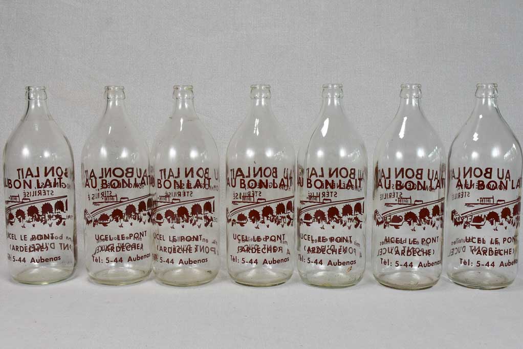 Collection of seven 1950's French milk bottles
