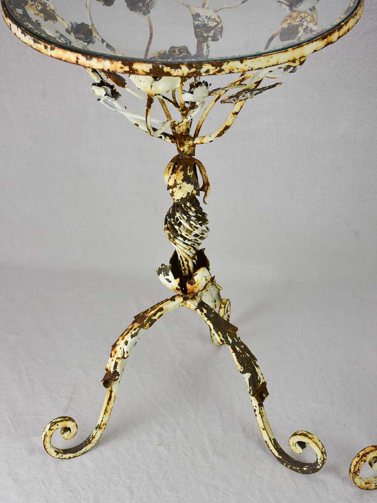 Pair of pretty weathered side tables with floral decoration and glass top