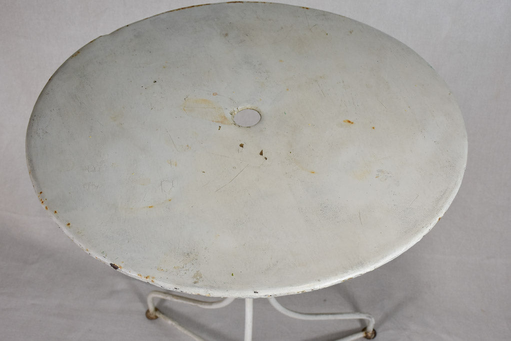 Antique French garden table with white paint finish
