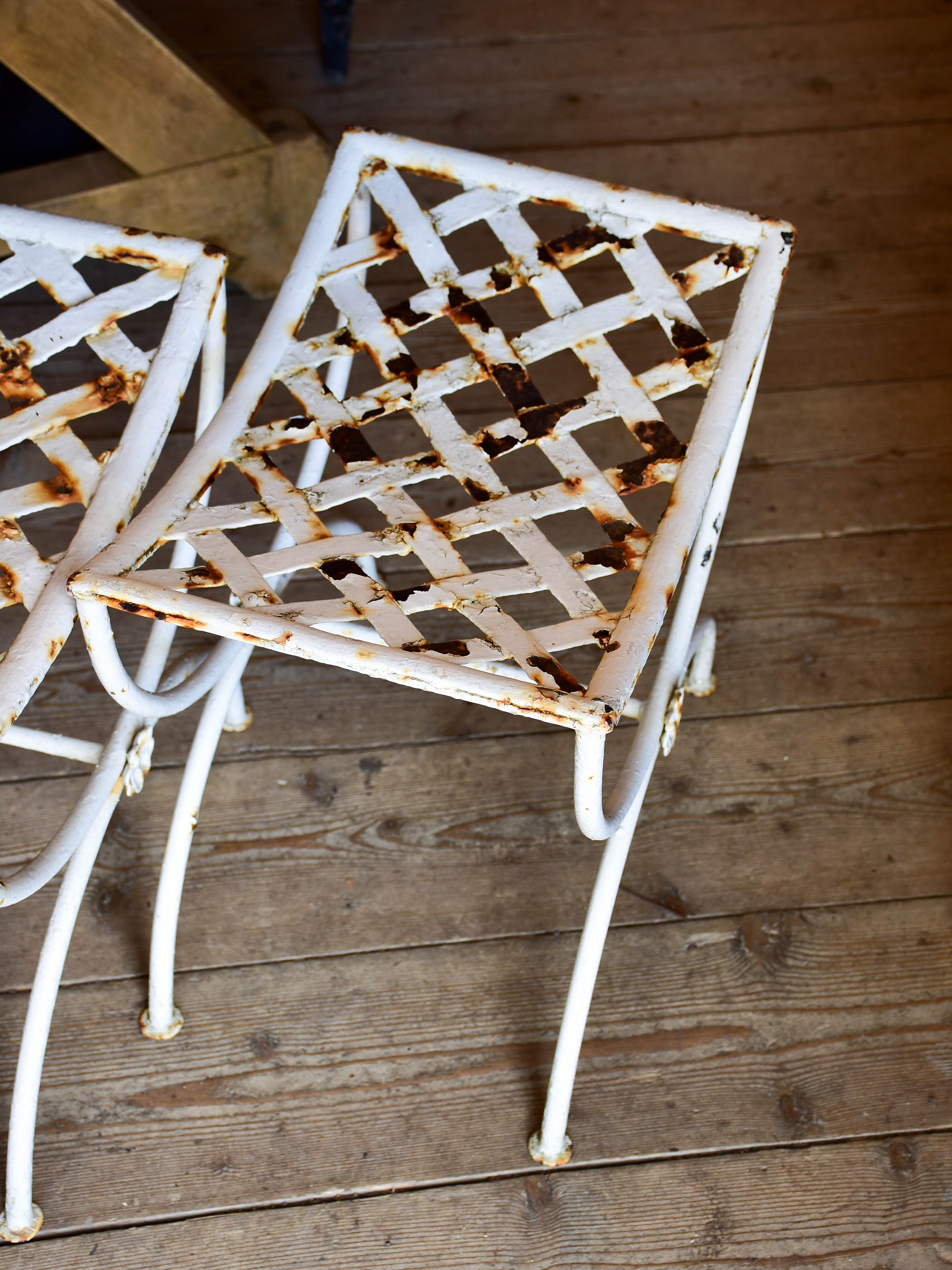 Four vintage French iron garden stools