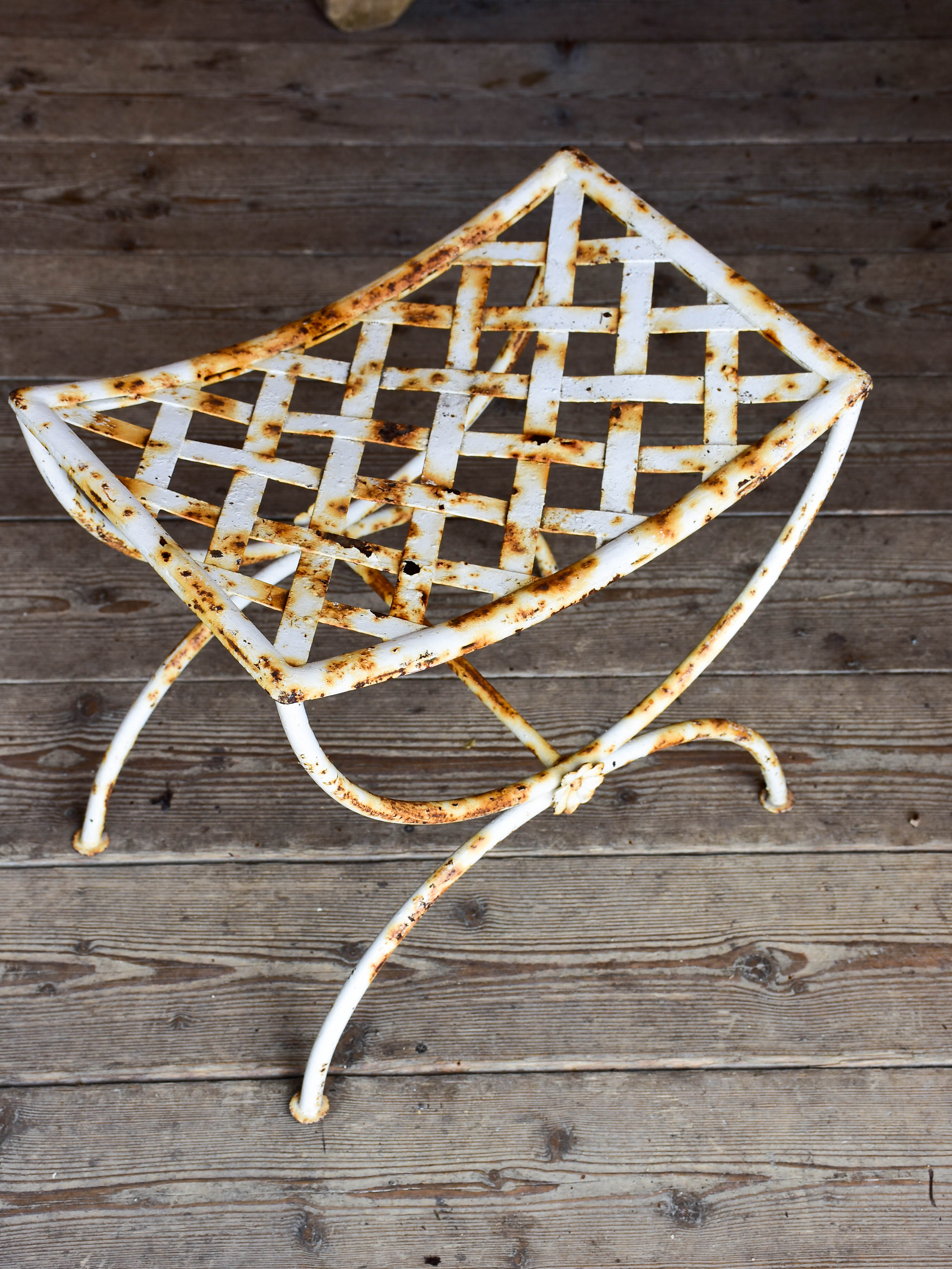 Four vintage French iron garden stools
