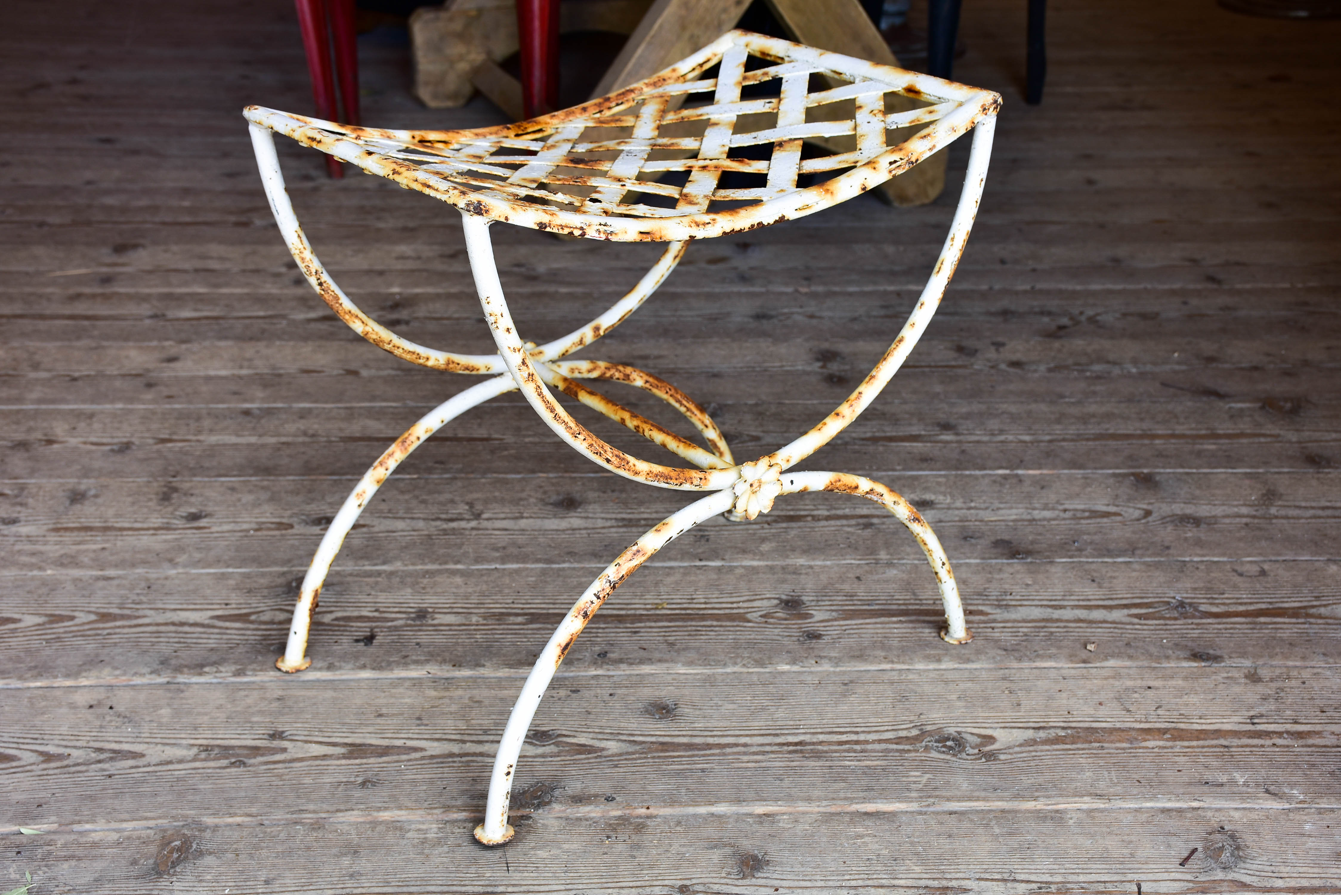 Four vintage French iron garden stools