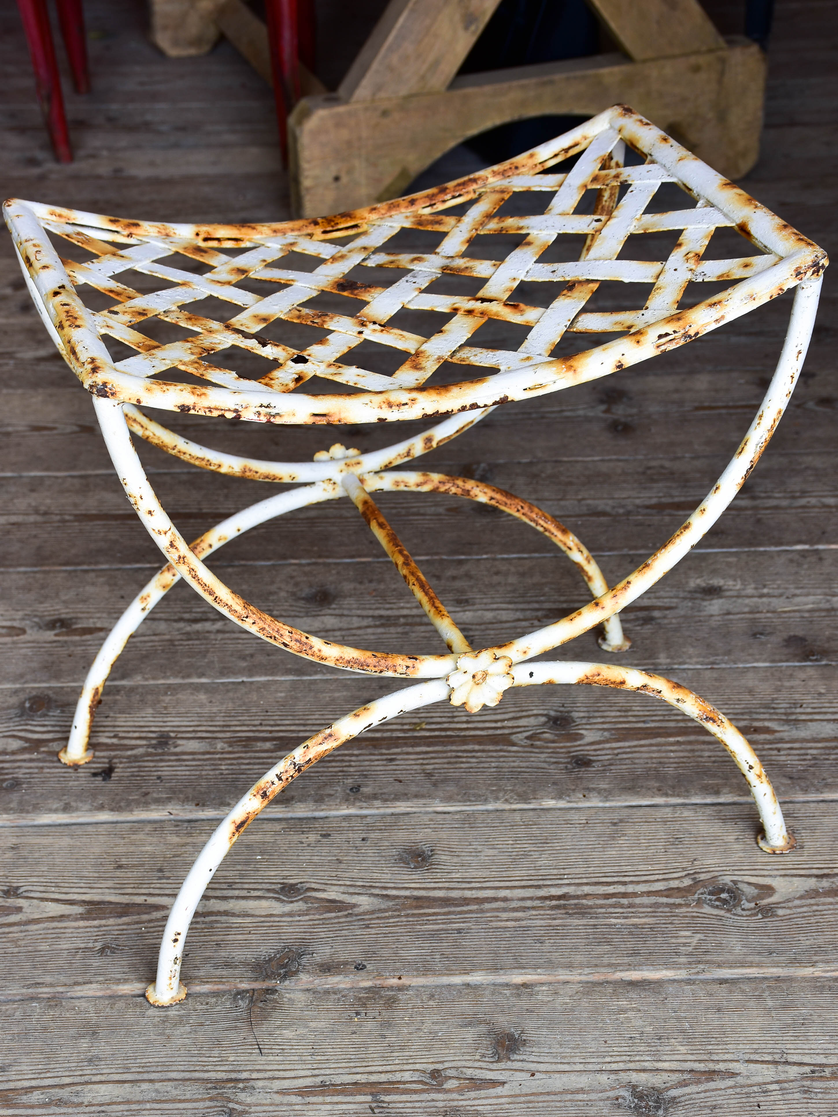 Four vintage French iron garden stools