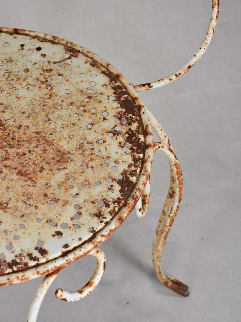 Armchairs exhibiting age-consistent patina