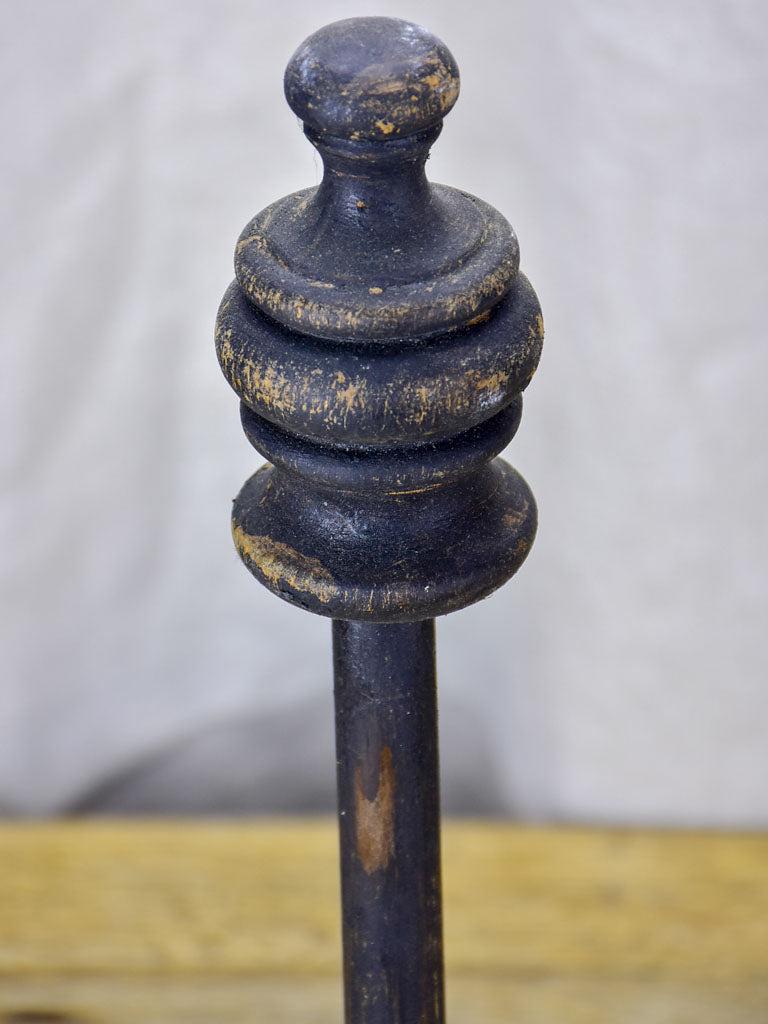 Two hat stands with black patina