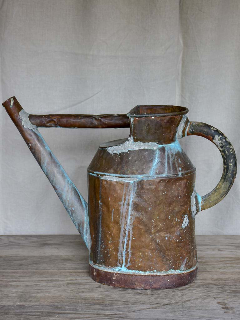 Antique French copper watering can with brace
